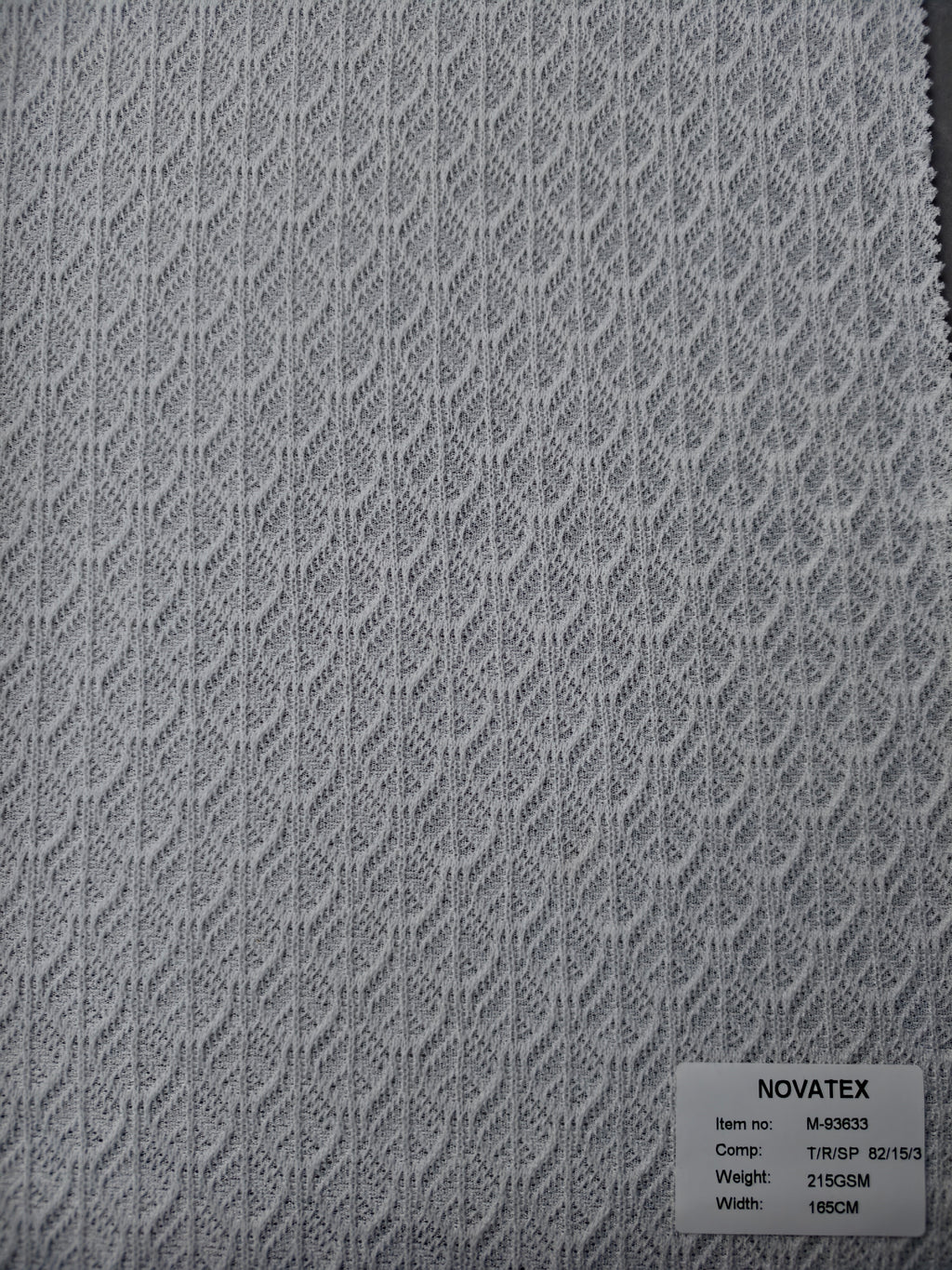 Maille jacquard en polyester, viscose et élasthanne – M93633