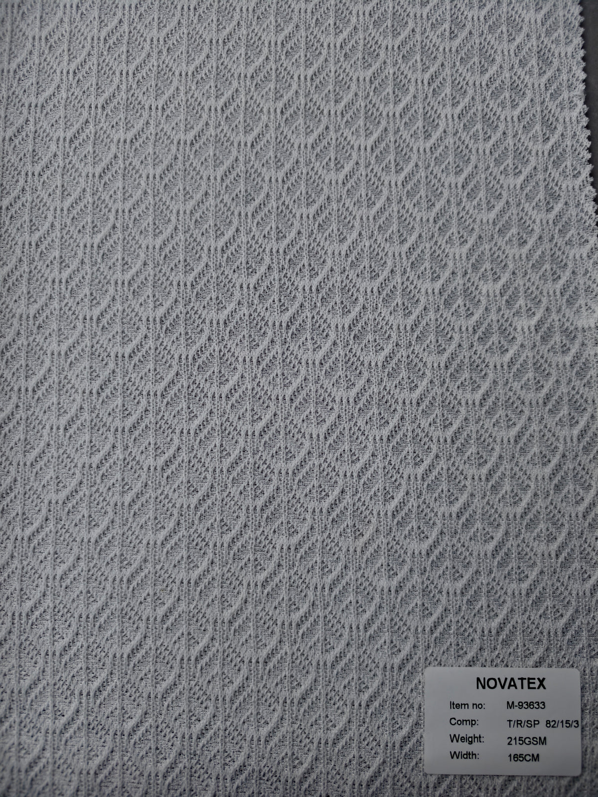 Maille jacquard en polyester, viscose et élasthanne – M93633